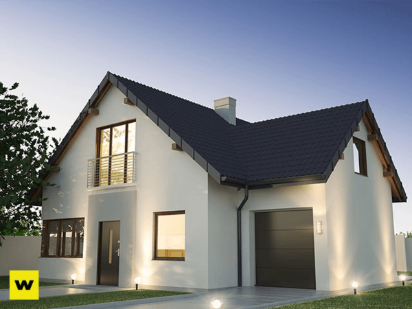 Modernes Einfamilienhaus mit Garage, Garten und Balkon bei Sonnenuntergang.